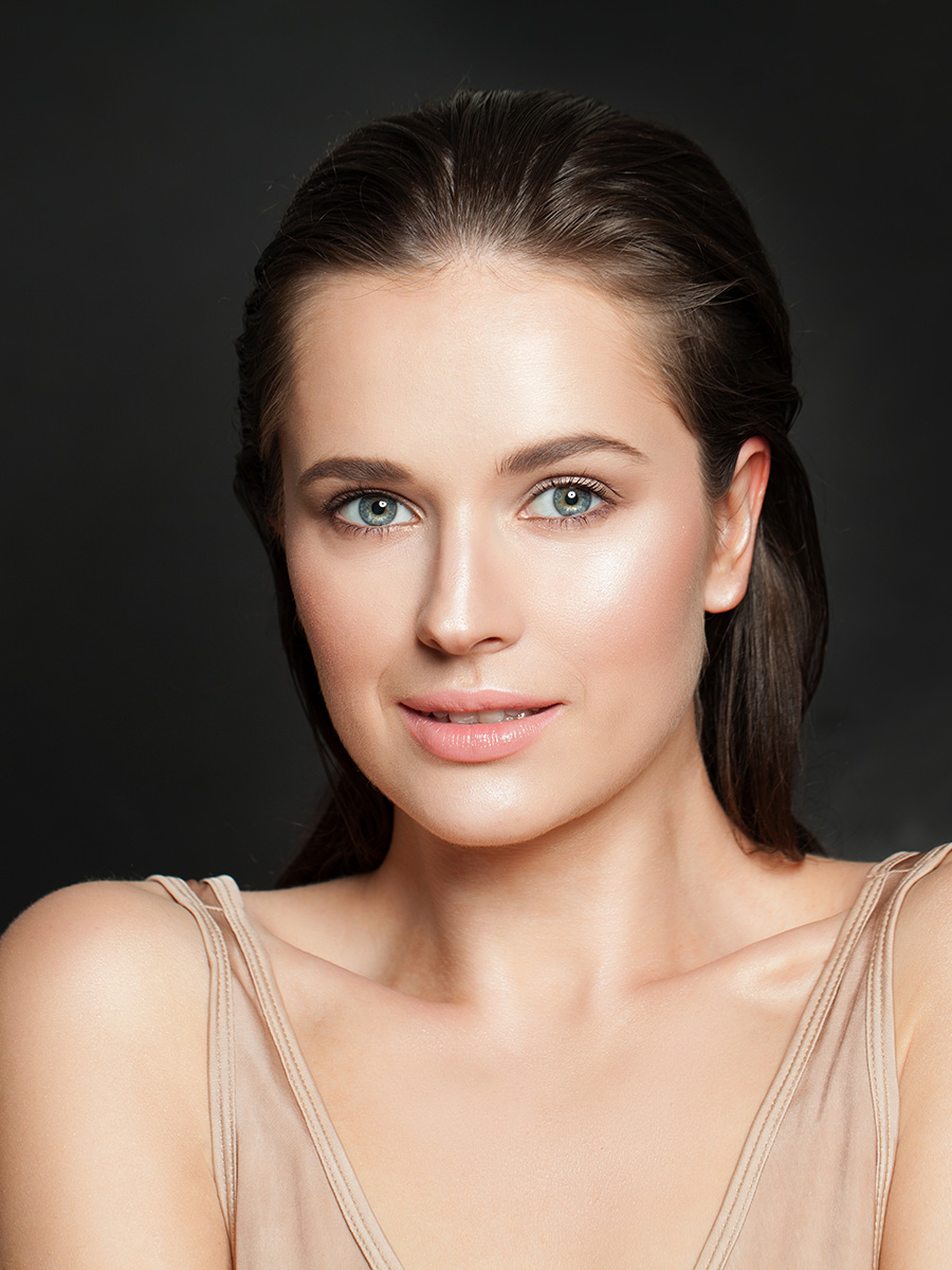 Woman with light skin smiling
