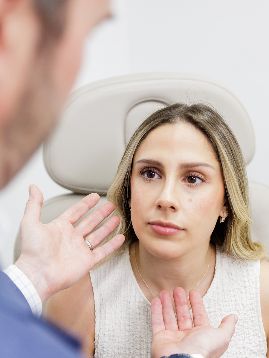 Dr. Medina Consulting with a patient