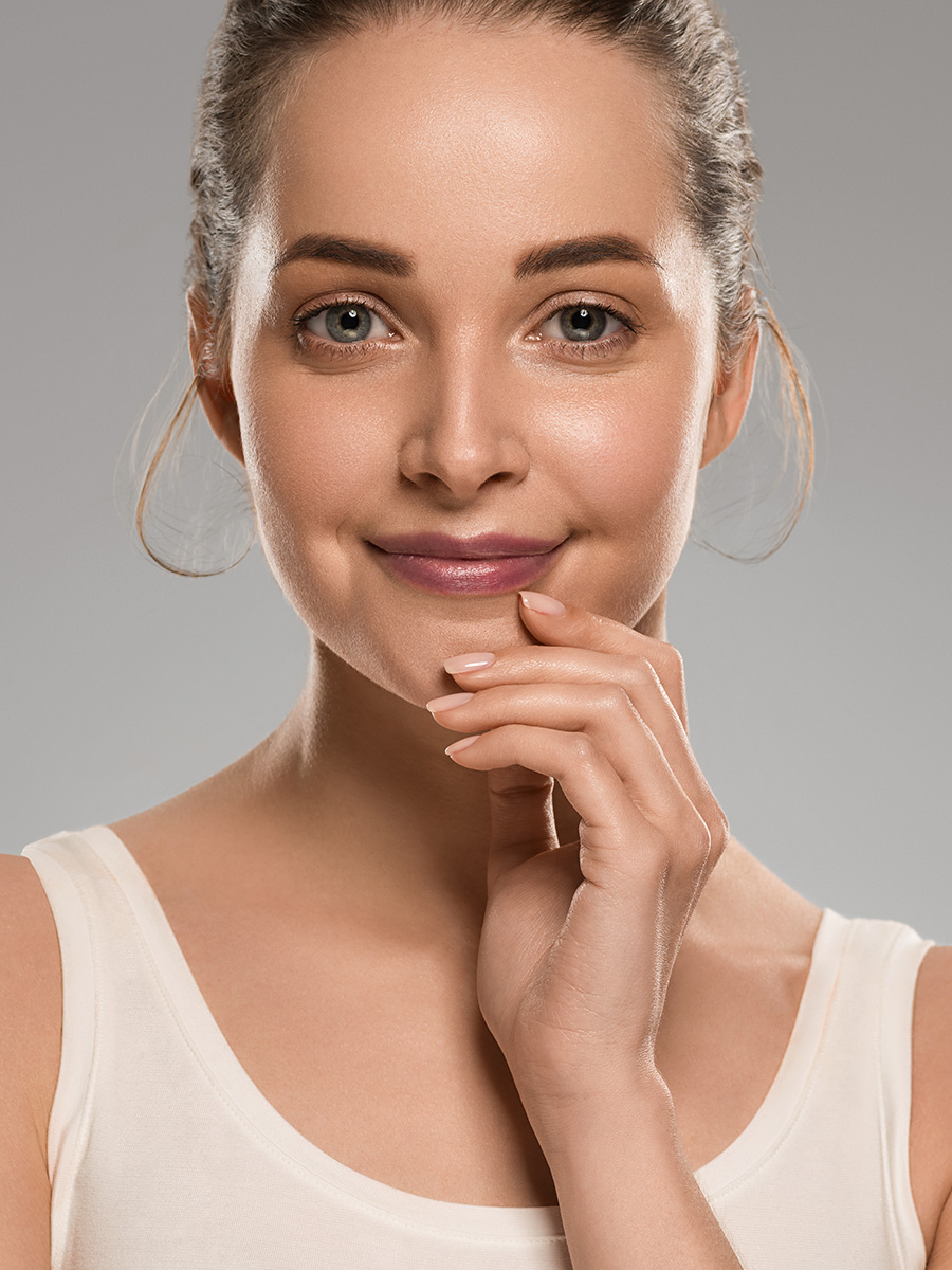 Woman touching her chin